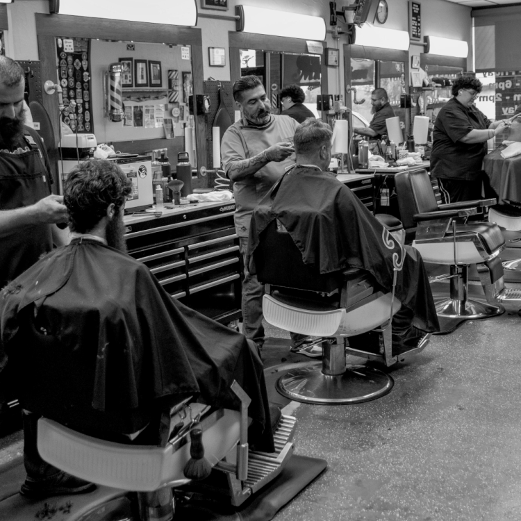 Row of Barbers working